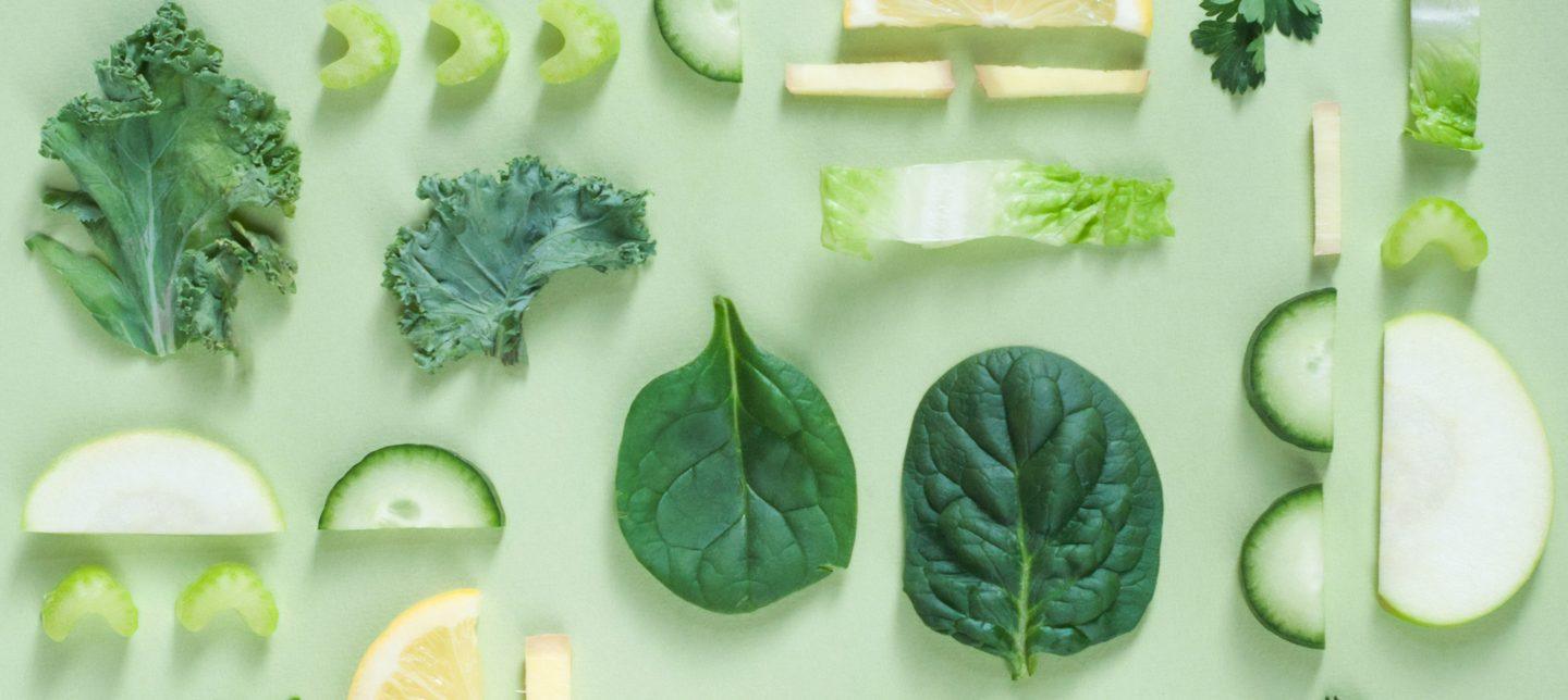 assorted cut green veggies on green table
