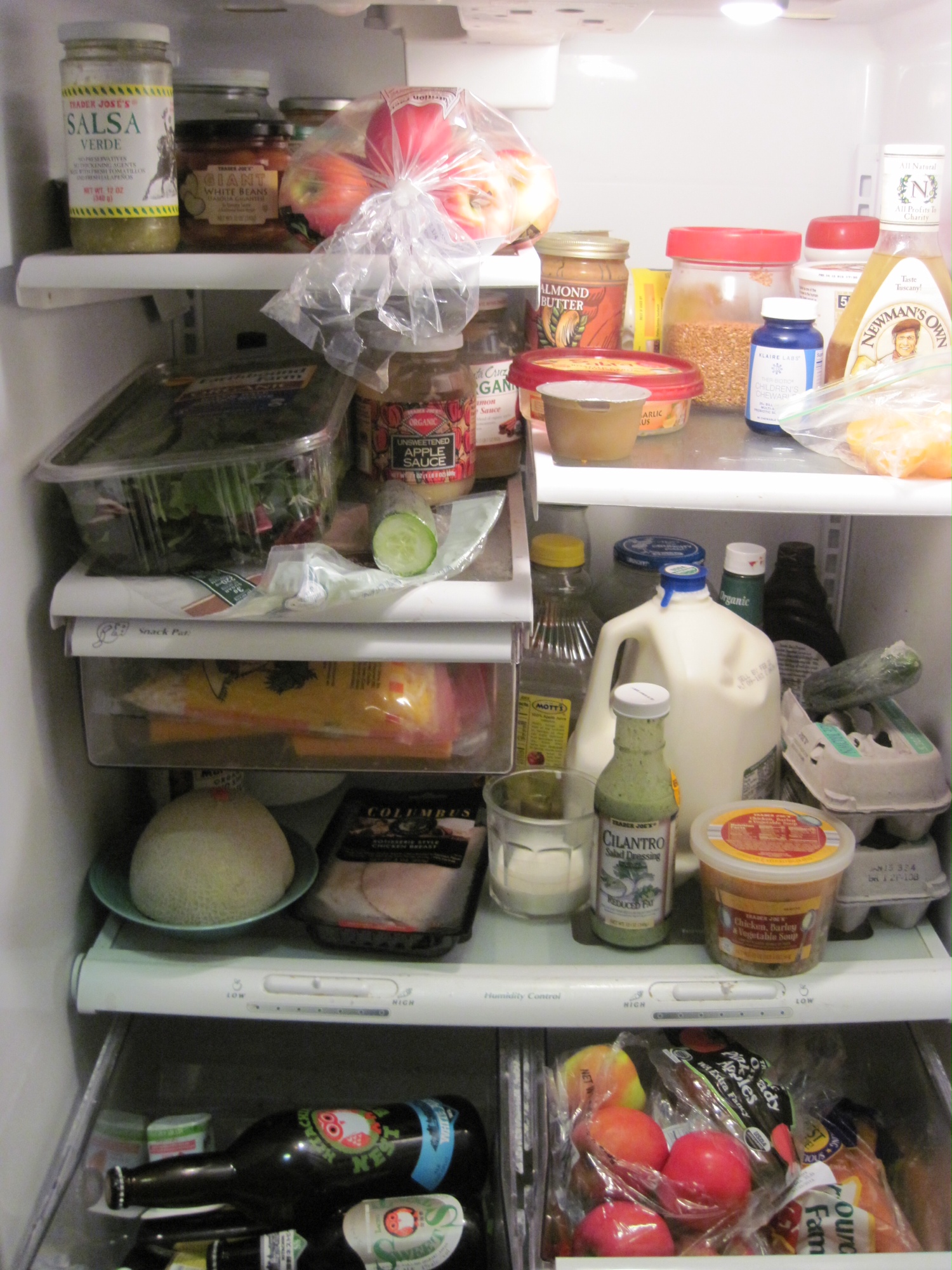 a close up of a well stocked fridge 