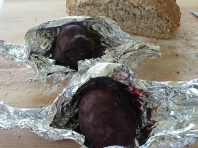 beets in opened tin foil boat out of the oven