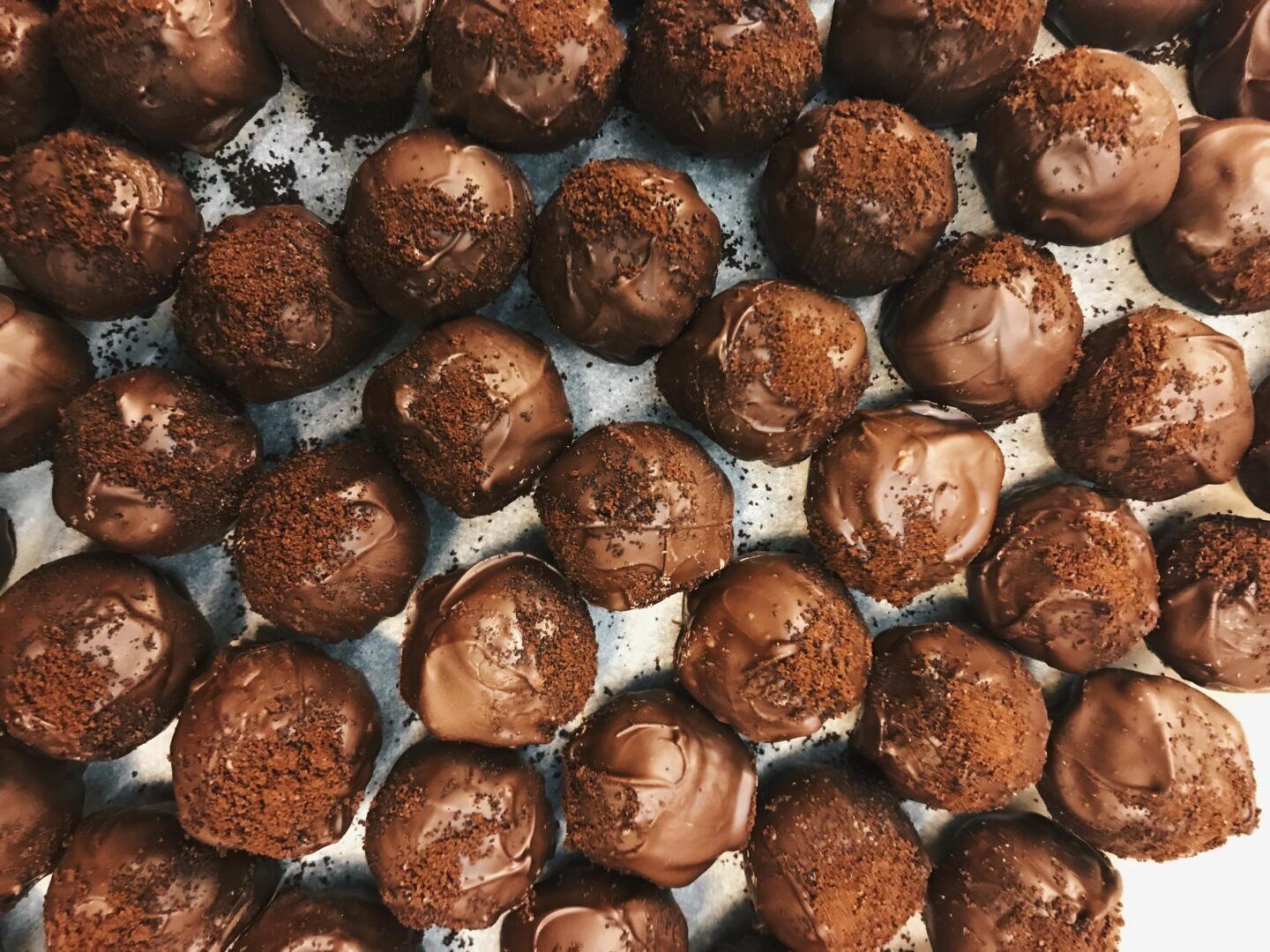 Freshly made, decadent, chocolate truffles, ready for a night of romance and love