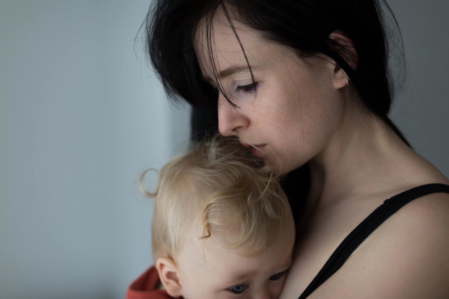 Mother holding her baby