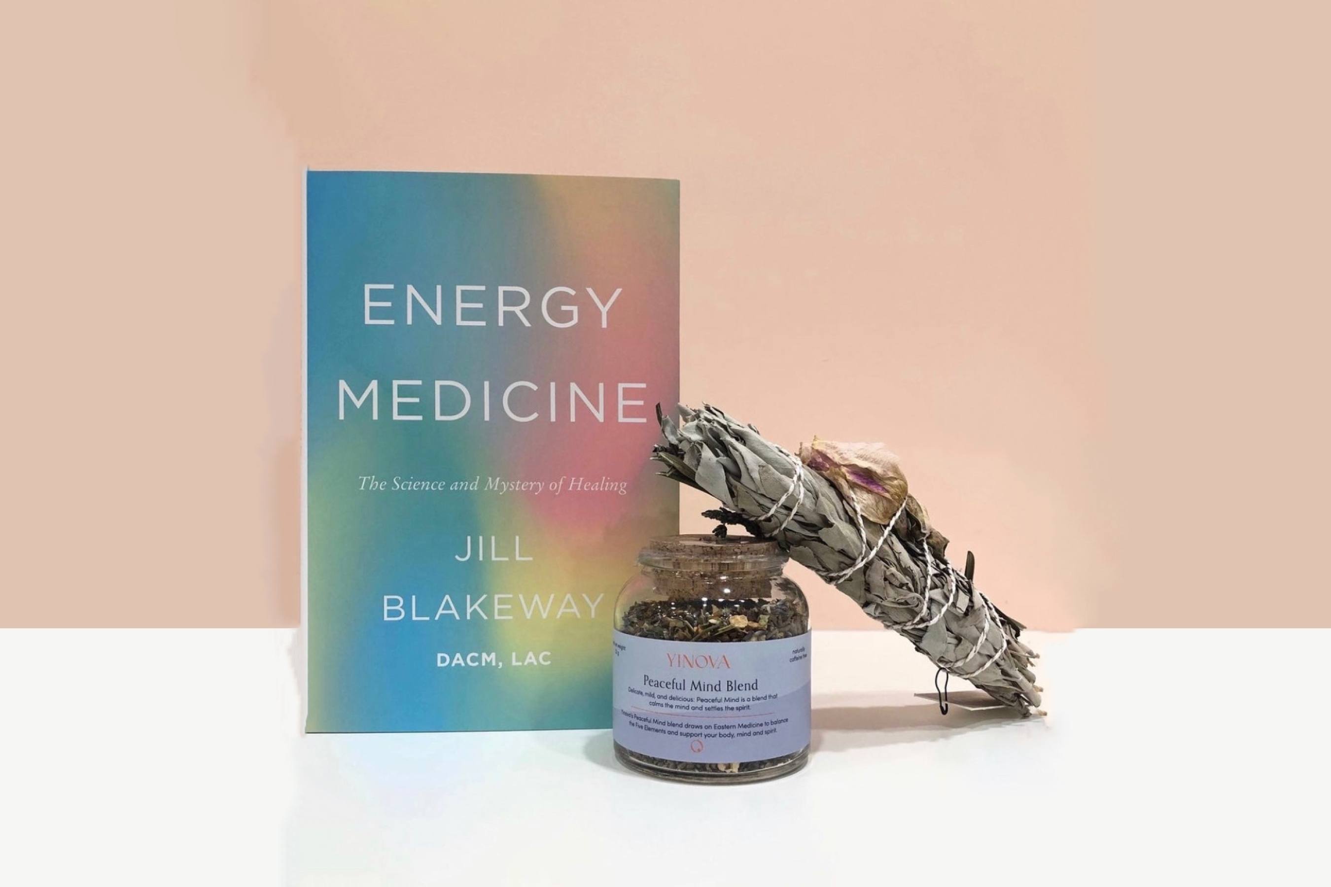 Energy medicine the book with peaceful mind tea and a sage stick