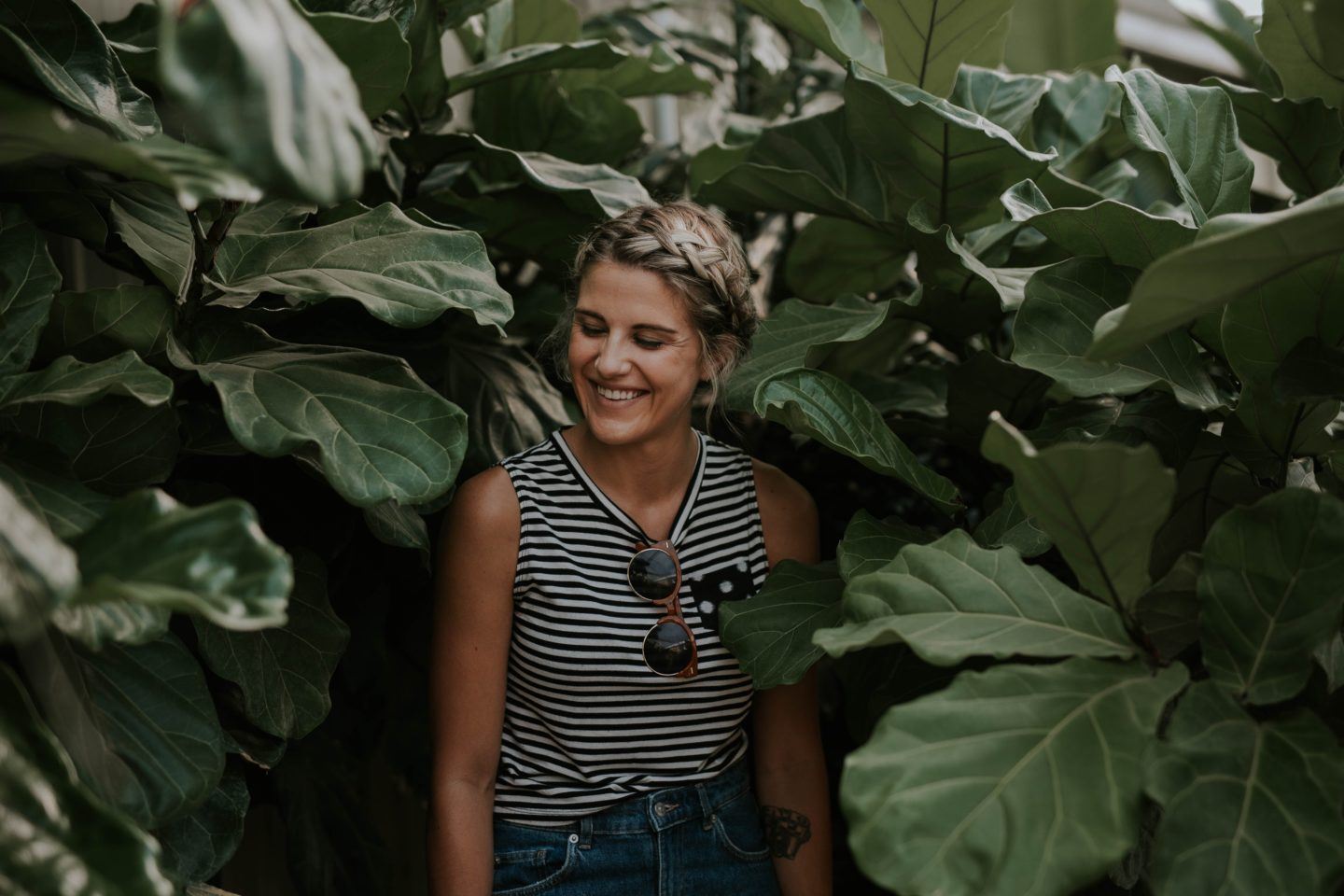 Women surrounded by giant leaves