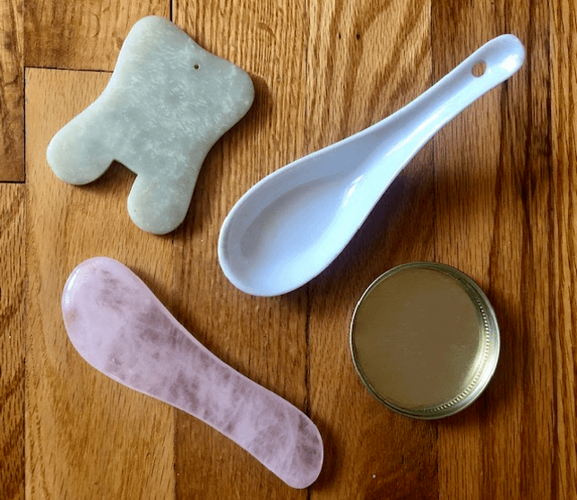 Various Gua Sha Tools on a table