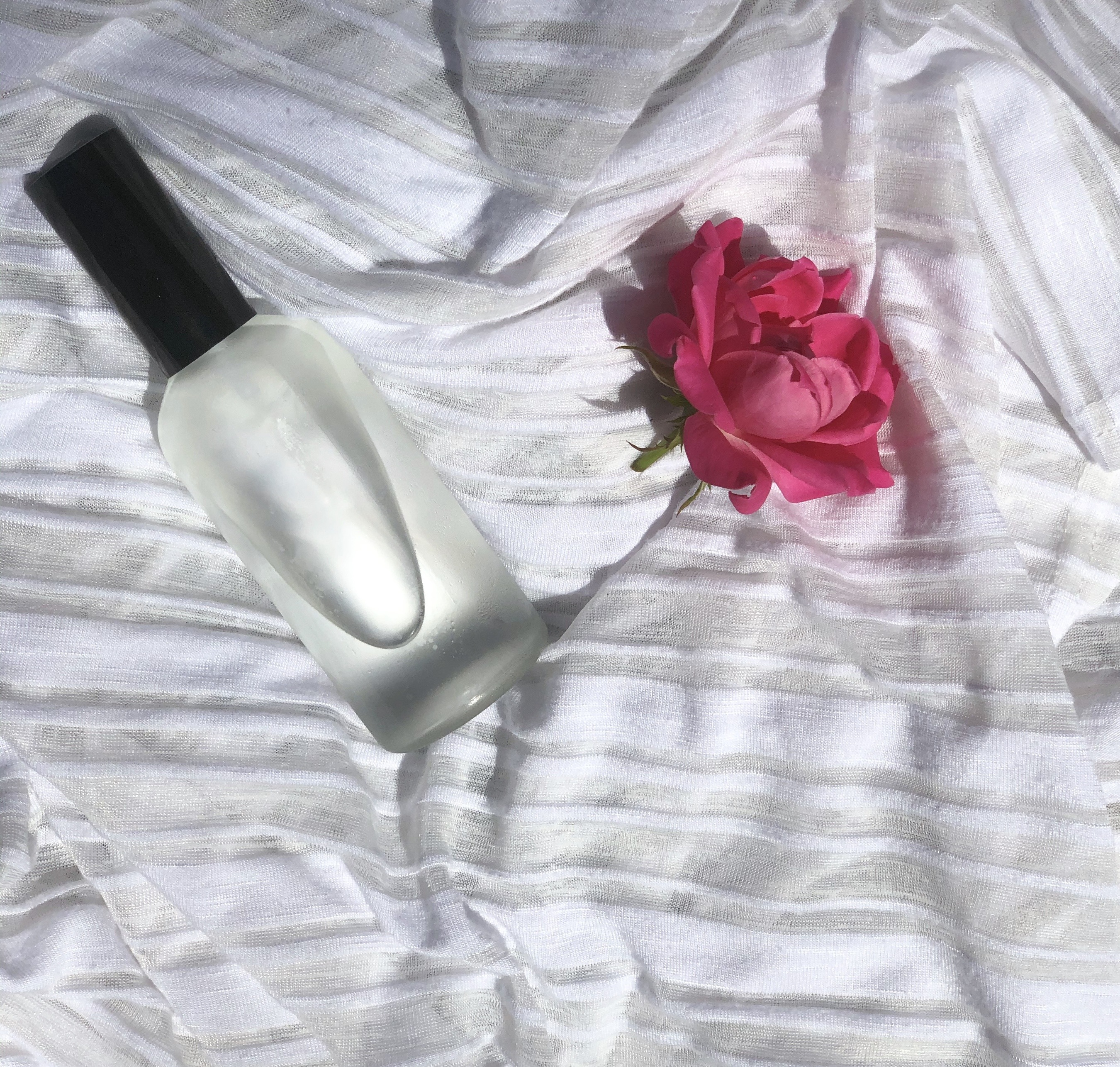 mist bottle with pink rose