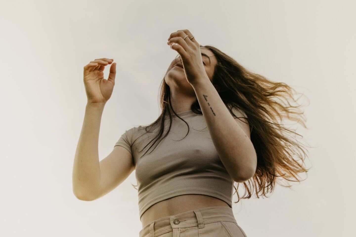 Woman with her arms in the air